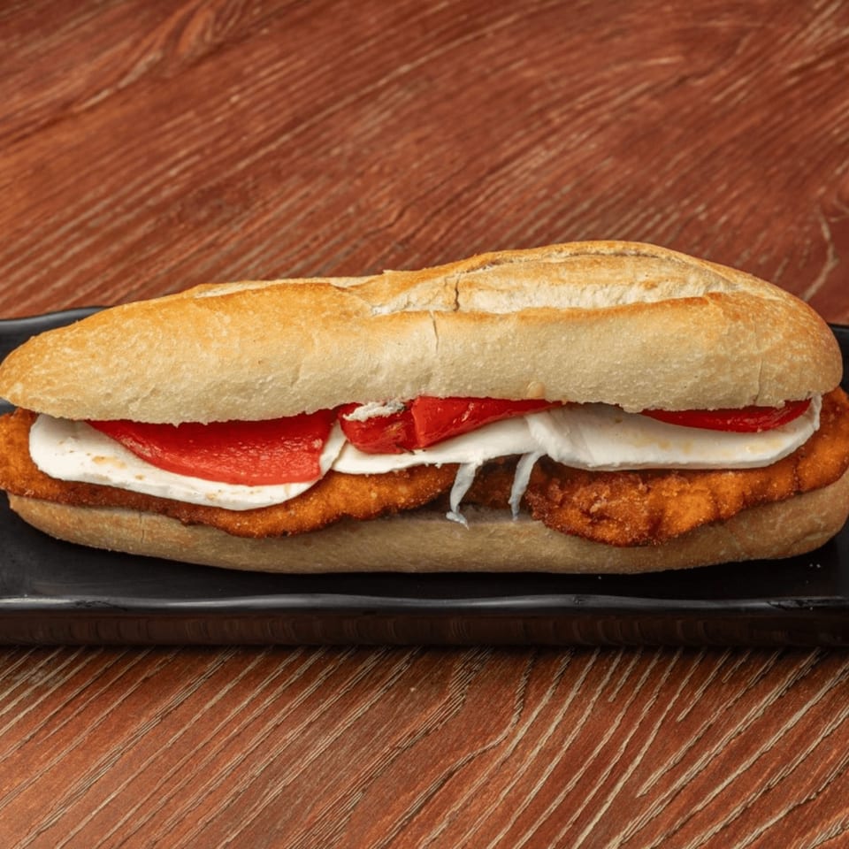 Nonna's Italian Deli & Market's chicken cutlet sandwich with fresh mozzarella and roasted red peppers.